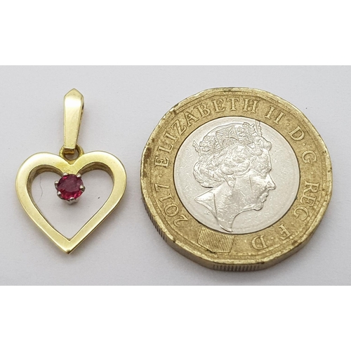 341 - A 18K YELLOW GOLD ( TESTED ) RUBY SET HEART PENDANT. 1.9G IN WEIGHT. 1.2CM IN LENGTH. Ref: SC 5080.