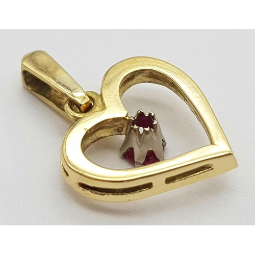 341 - A 18K YELLOW GOLD ( TESTED ) RUBY SET HEART PENDANT. 1.9G IN WEIGHT. 1.2CM IN LENGTH. Ref: SC 5080.