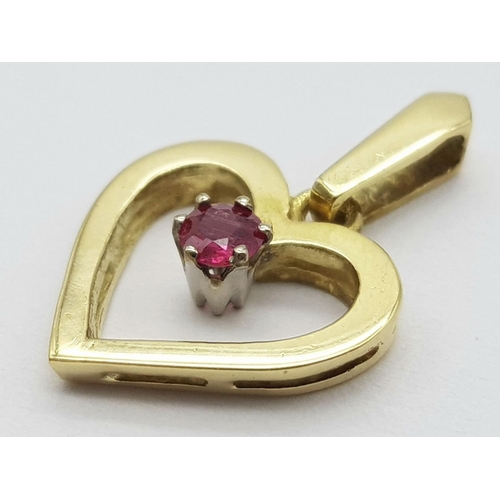 341 - A 18K YELLOW GOLD ( TESTED ) RUBY SET HEART PENDANT. 1.9G IN WEIGHT. 1.2CM IN LENGTH. Ref: SC 5080.