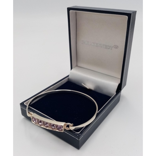 364 - Genuine PAUL KENNEDY SILVER BANGLE. Set with 5 x light catching gemstones. Presented in the original... 