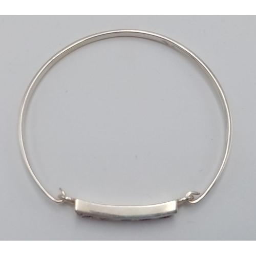 364 - Genuine PAUL KENNEDY SILVER BANGLE. Set with 5 x light catching gemstones. Presented in the original... 