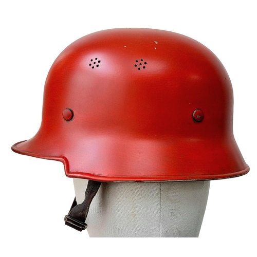 373 - Early German M34 Square Peak Helmet with liner and chin strap. Painted Red with the KDF Factory logo... 