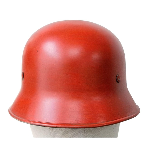 373 - Early German M34 Square Peak Helmet with liner and chin strap. Painted Red with the KDF Factory logo... 