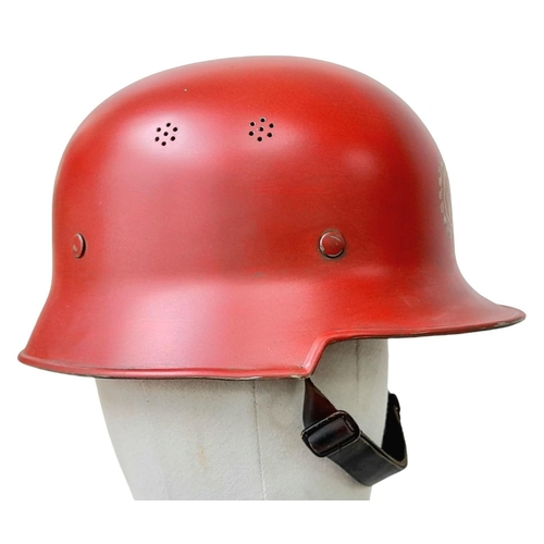 373 - Early German M34 Square Peak Helmet with liner and chin strap. Painted Red with the KDF Factory logo... 