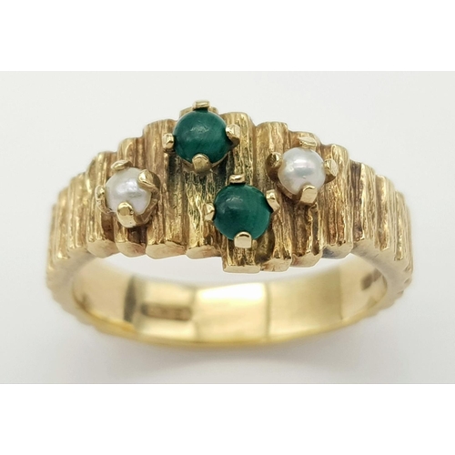 406 - Hallmarked 9 carat GOLD RING with JADE and SEED PEARL DETAIL. Attractive textured GOLD top and shoul... 