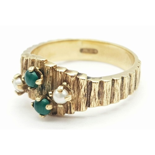 406 - Hallmarked 9 carat GOLD RING with JADE and SEED PEARL DETAIL. Attractive textured GOLD top and shoul... 