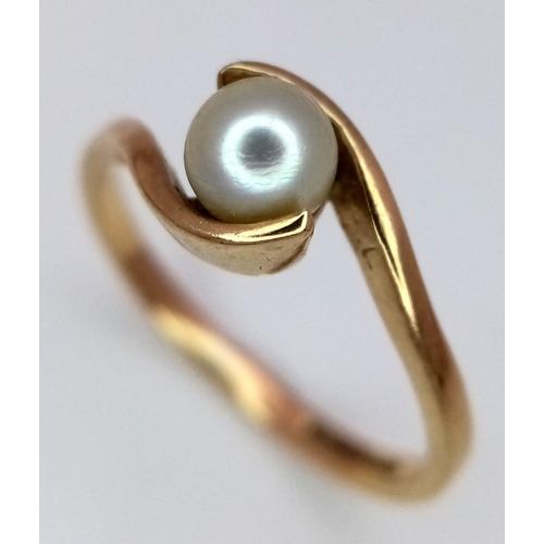 413 - Dainty 9 carat GOLD CROSSOVER RING with single pearl set to top. Fully hallmarked and complete with ... 