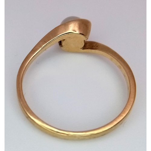 413 - Dainty 9 carat GOLD CROSSOVER RING with single pearl set to top. Fully hallmarked and complete with ... 