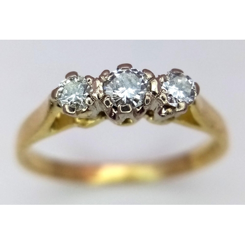 439 - A 18K YELLOW GOLD DIAMOND 3 STONE RING. 0.30CT. 1.9G IN WEIGHT. SIZE K. Ref: SC 5050.