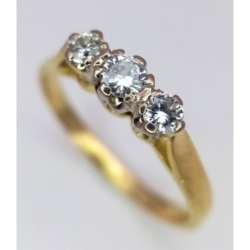 439 - A 18K YELLOW GOLD DIAMOND 3 STONE RING. 0.30CT. 1.9G IN WEIGHT. SIZE K. Ref: SC 5050.