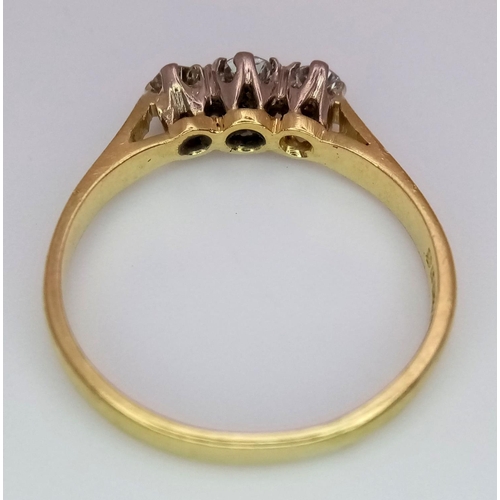 439 - A 18K YELLOW GOLD DIAMOND 3 STONE RING. 0.30CT. 1.9G IN WEIGHT. SIZE K. Ref: SC 5050.