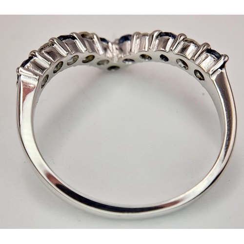 446 - A 18K WHITE GOLD DIAMOND & SAPPHIRE WISHBONE SHAPED BAND RING 0.25CT DIAMONDS & 0.30CT SAPPHIRES. 3.... 