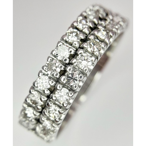 453 - A 18K WHITE GOLD DIAMOND 2 ROW RING. 0.75CT. 5.7G IN WEIGHT. SIZE U. Ref: 8089.