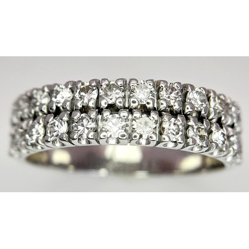 453 - A 18K WHITE GOLD DIAMOND 2 ROW RING. 0.75CT. 5.7G IN WEIGHT. SIZE U. Ref: 8089.