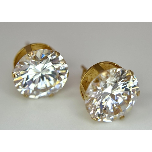 49 - Impressive 9 carat GOLD EARRINGS with COLOUR CATCHING CRYSTAL SEARCHLIGHT GEMSTONES. Complete with 9... 