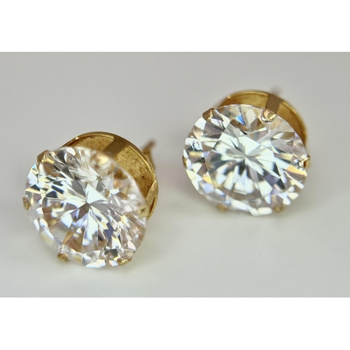 49 - Impressive 9 carat GOLD EARRINGS with COLOUR CATCHING CRYSTAL SEARCHLIGHT GEMSTONES. Complete with 9... 