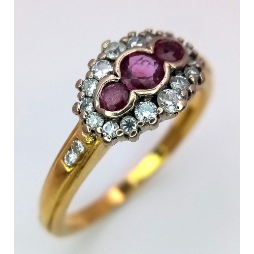 495 - A 18K YELLOW GOLD DIAMOND & RUBY CLUSTER RING. 0.25CT. 4.65G IN WEIGHT. SIZE R. Ref: SC 5038.