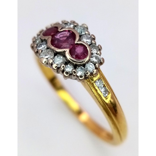 495 - A 18K YELLOW GOLD DIAMOND & RUBY CLUSTER RING. 0.25CT. 4.65G IN WEIGHT. SIZE R. Ref: SC 5038.