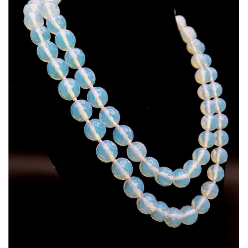 498 - A Romantic Matinee Length Moonstone Beaded Necklace. 90cm necklace length. 10mm faceted beads.