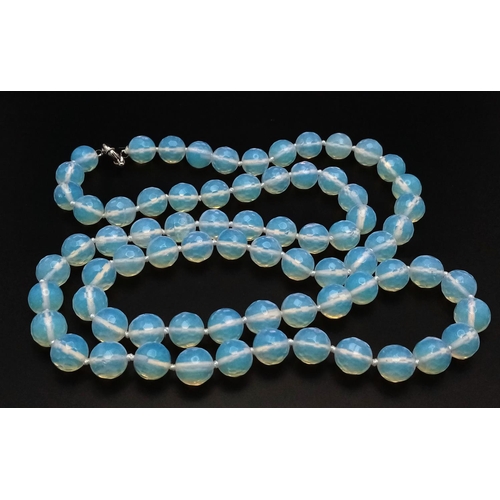 498 - A Romantic Matinee Length Moonstone Beaded Necklace. 90cm necklace length. 10mm faceted beads.