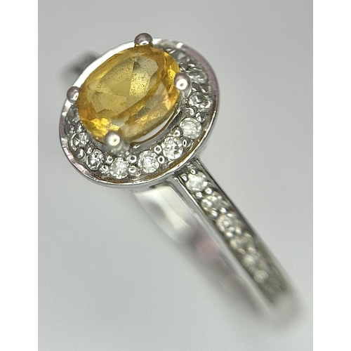 607 - A 9K WHITE GOLD DIAMOND & CITRINE CLUSTER RING - 0.13CT. 1.9G. SIZE J. REF: A/S 1070