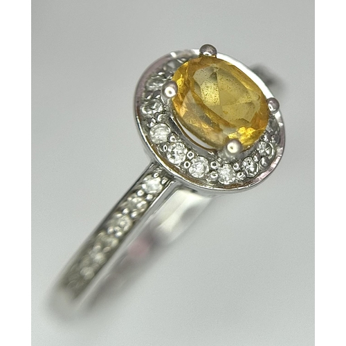 607 - A 9K WHITE GOLD DIAMOND & CITRINE CLUSTER RING - 0.13CT. 1.9G. SIZE J. REF: A/S 1070