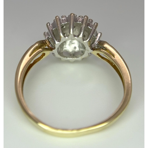 706 - A 9K YELLOW GOLD DIAMOND CLUSTER RING - 2.2G. SIZE L.
REF: SPAS 5002