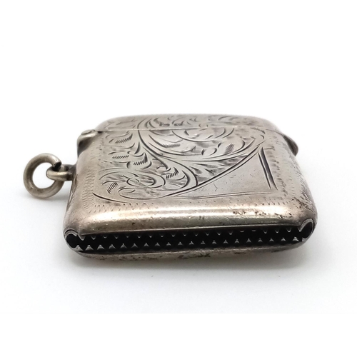 919 - A Sterling Silver Vesta Case. Hallmarks for Birmingham 1945.
4.5 x 3.5cm. 25g