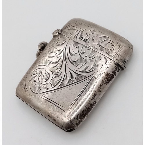 919 - A Sterling Silver Vesta Case. Hallmarks for Birmingham 1945.
4.5 x 3.5cm. 25g