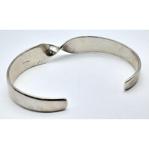 1109 - A Sterling Silver Vintage Cuff Twist Bangle. 20g