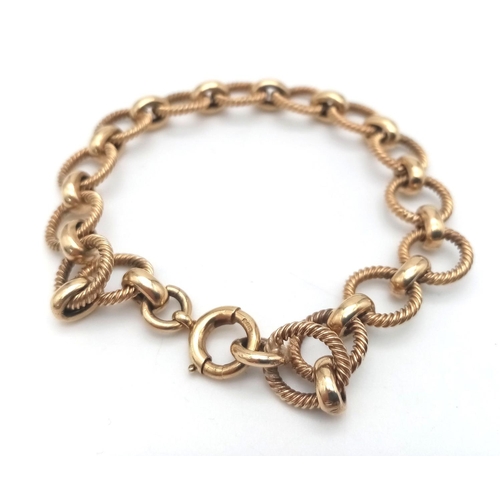 113 - A 9K Yellow Gold Circle Link Bracelet. 17cm length. 18.7g.