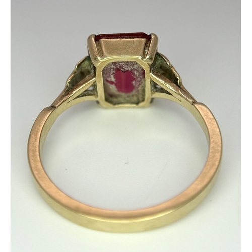 120 - A 9K Yellow Gold (tested) Ruby Ring. Size N 1/2. 2.6g total weight.