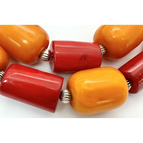 223 - A vintage - and still in vogue - red coral and orange amber Bakelite necklace, bracelet and earrings... 