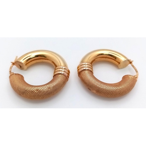 24 - A Pair of Stylish 9K Yellow Gold Creole Hoop Earrings. 27mm diameter. 4.4g. Some small indentations ... 