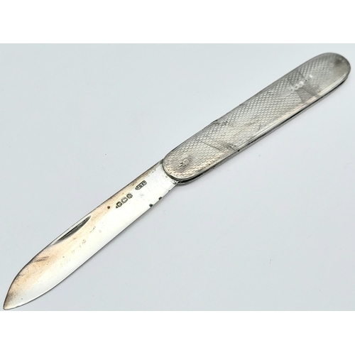 548 - A Vintage Sterling Silver Penknife. Hallmarks on case and blade. 15cm fully extended. 6.5cm blade le... 