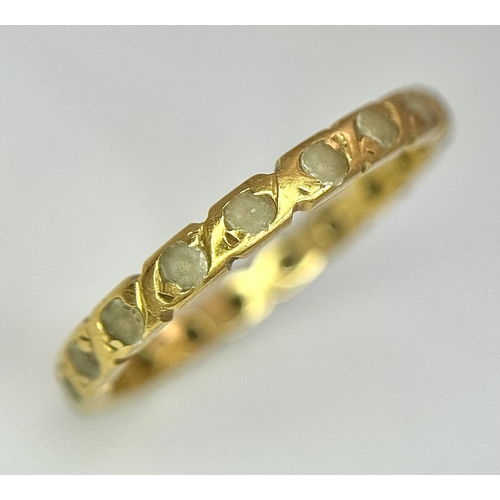 554 - An 18K Gold (tested) White Stone Ring. Size M. 1.75g total weight.