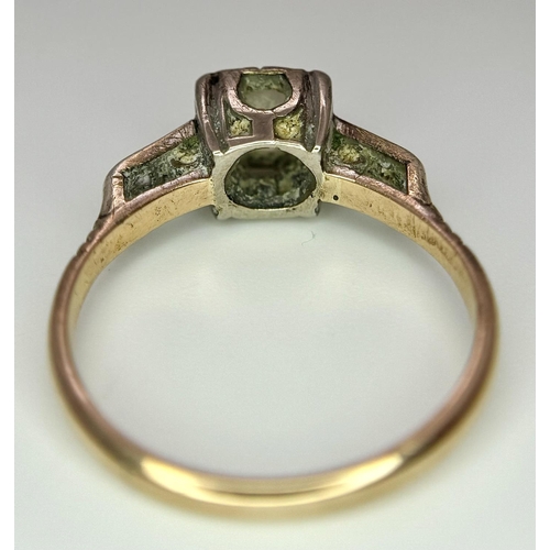 568 - A Vintage 18K Yellow Gold and Platinum Diamond Ring. 0.75ct central diamond with diamond accents. Si... 