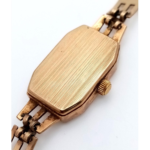 570 - A Vintage 9K Yellow Gold Rotary Ladies Quartz Watch. 9k gold bracelet and rectangular case - 12mm. N... 