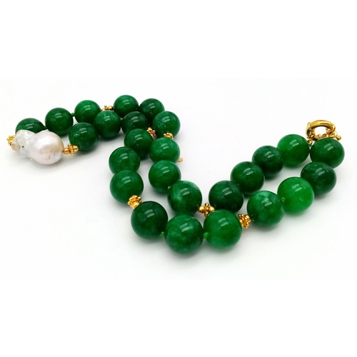 634 - A Sensual Green Jade Beaded Necklace with Baroque Pearl Accent. Large 14mm jade beads. Gilded spacer... 