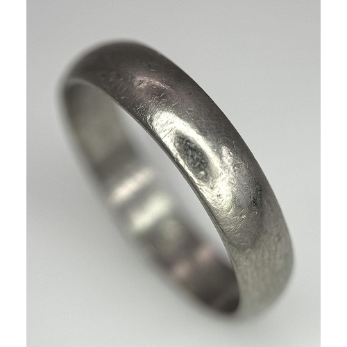 64 - A Vintage 18K White Gold Band Ring. 5mm width. Size S. 5.3g weight. Full UK hallmarks.