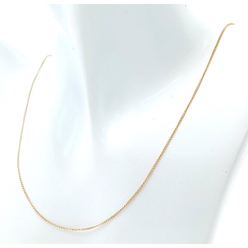 746 - A 9K Yellow Gold Disappearing Necklace. 54cm. 1.9g