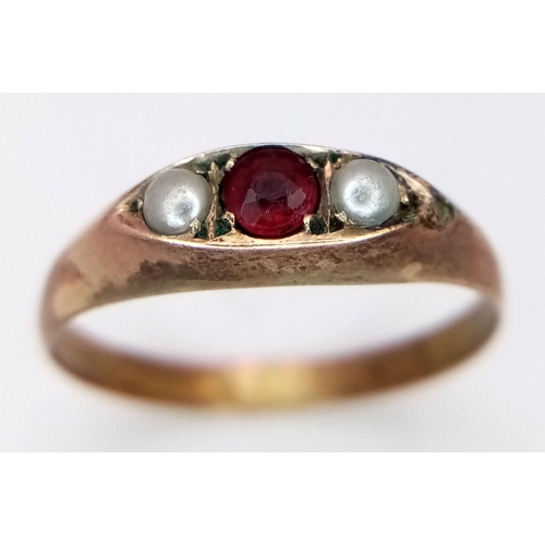 760 - A Vintage 9K Gold Garnet and Pearl Ring. Size P. 1.15g.