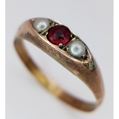 760 - A Vintage 9K Gold Garnet and Pearl Ring. Size P. 1.15g.