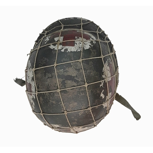 208 - WW2 US Medics Helmet. With a Capac Liner. Both Helmet and liner bear the red cross insignia. The hel... 