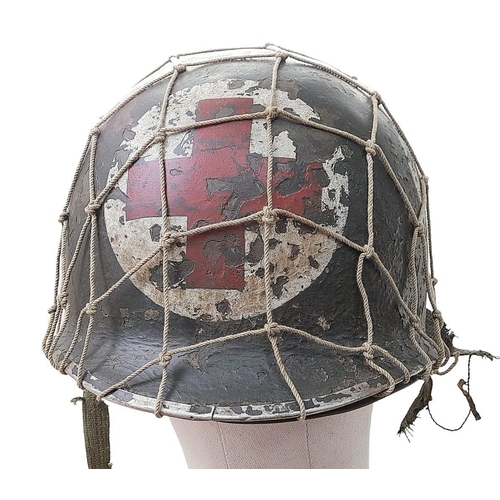 208 - WW2 US Medics Helmet. With a Capac Liner. Both Helmet and liner bear the red cross insignia. The hel... 