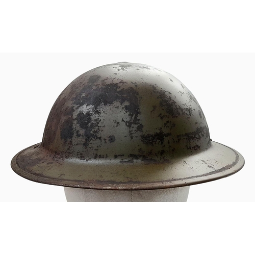 215 - 1939 Dated British Mk II Helmet and liner with unit flash of the Durham Light Infantry. The early B.... 