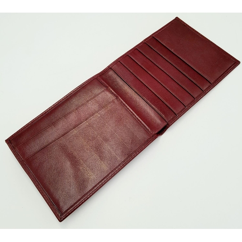 423 - An Unused Burgundy Leather Rolex Bank Notes & Card Wallet. Bi-Fold. 12x9.5cm Folded.