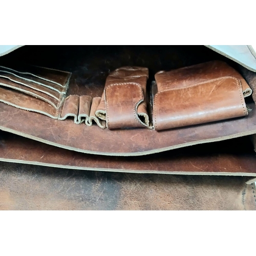 1079 - A HAND MADE OVERSIZED LEATHER SATCHEL MADE BY 