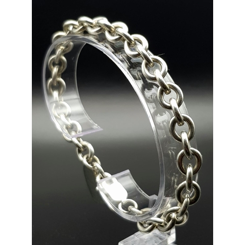 870 - An attractive Solid Silver 925 Belcher Chain Bracelet with a heart charm, 30.7g total weight, 21cm l... 