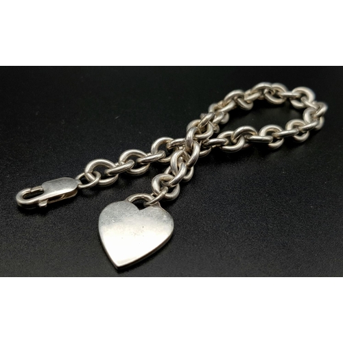 870 - An attractive Solid Silver 925 Belcher Chain Bracelet with a heart charm, 30.7g total weight, 21cm l... 